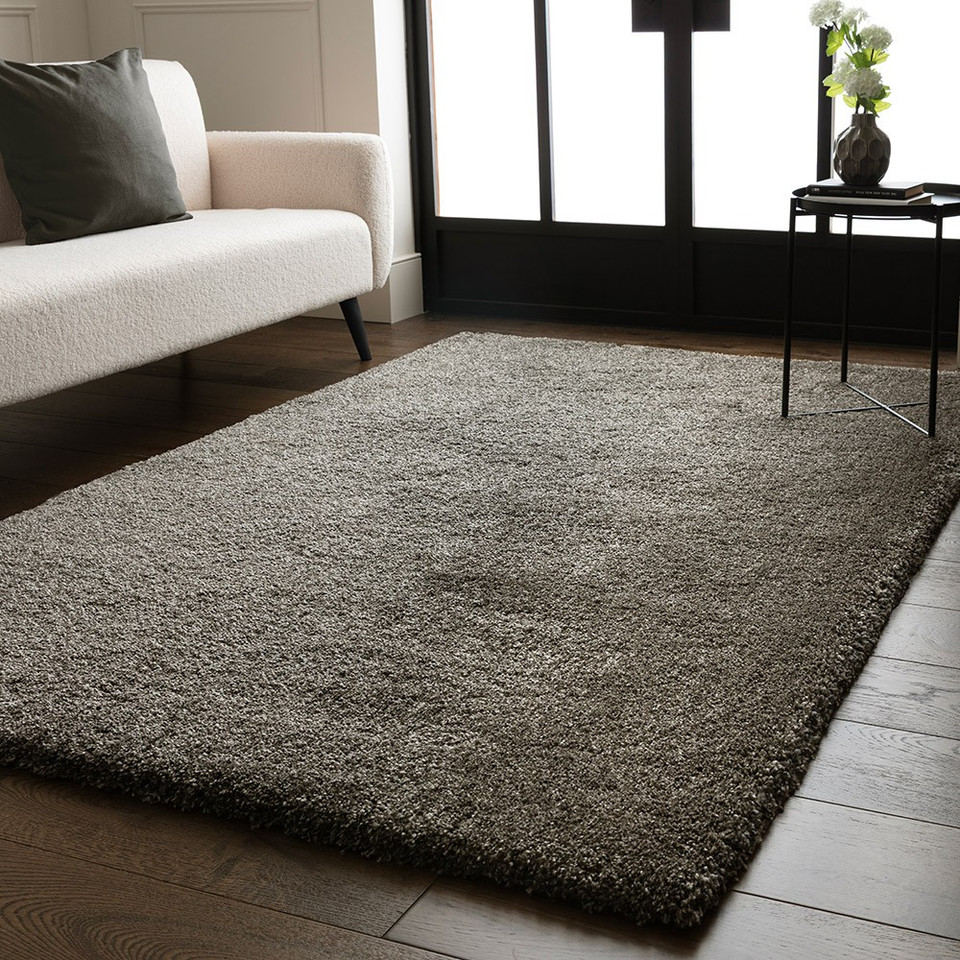 gunmetal shaggy rug in a living room with matching decor