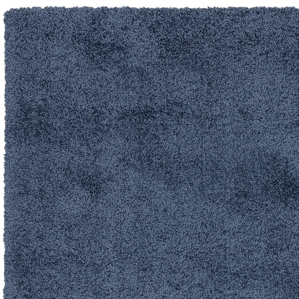navy shaggy rug closeup closeup corner portrait
