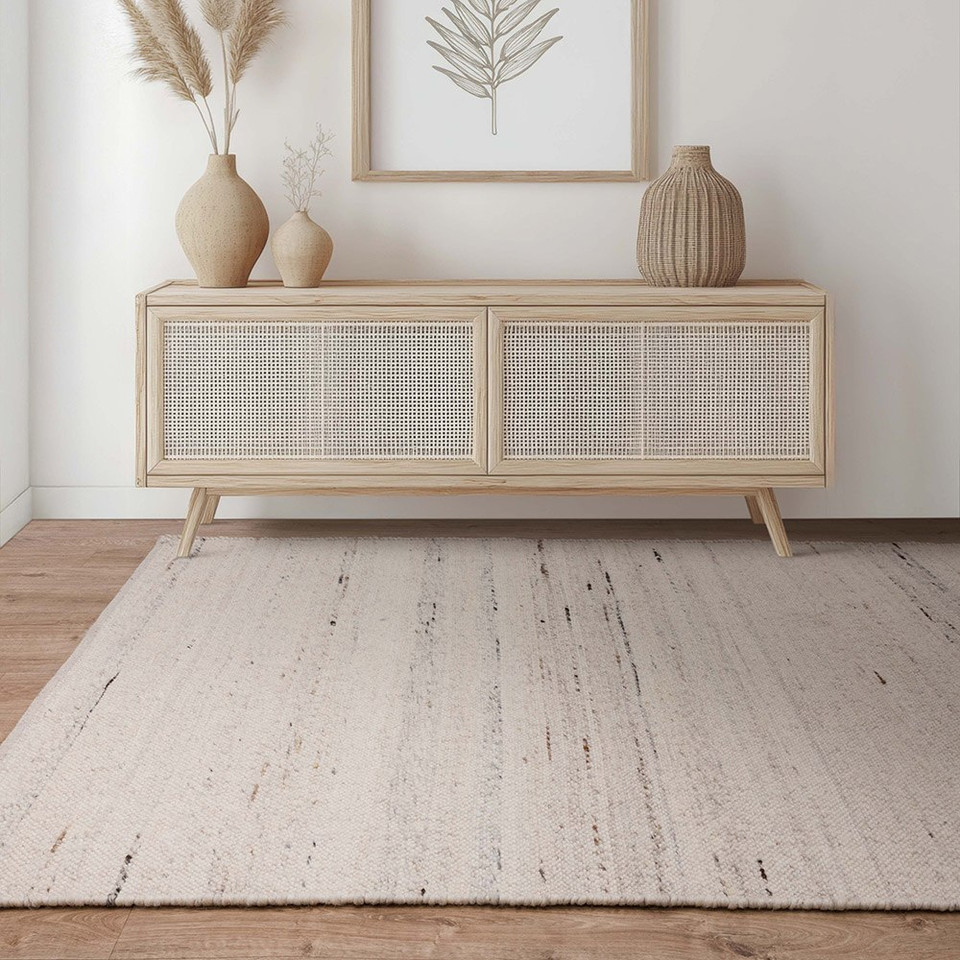 ivory plain rug in a living room with matching decor