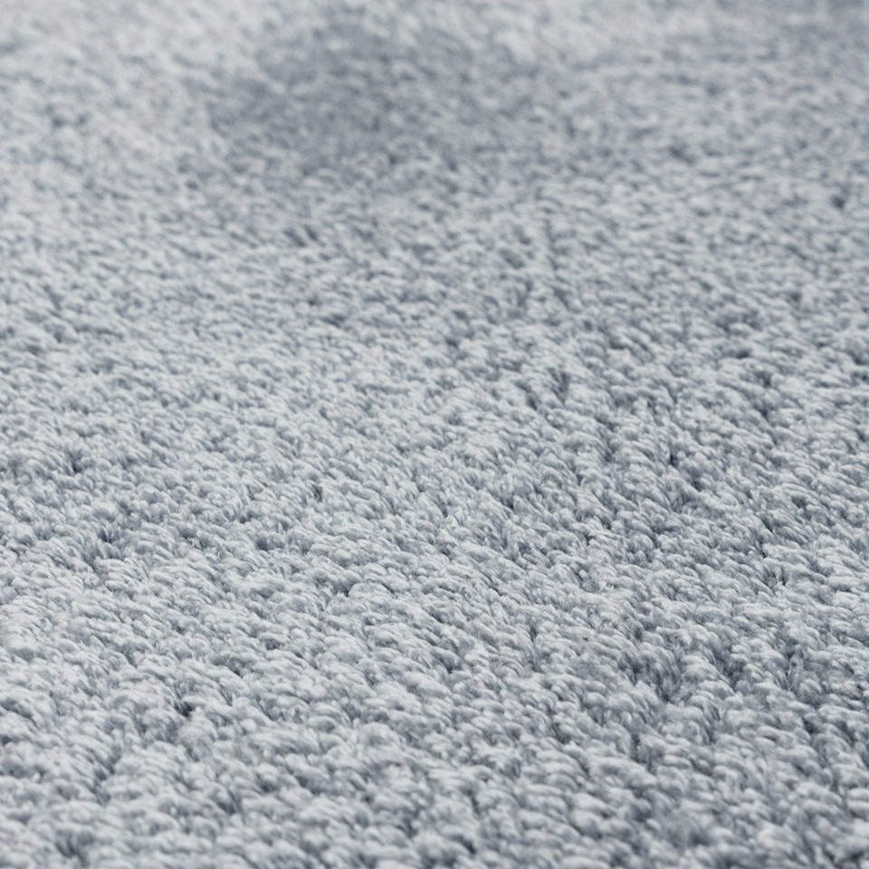 blue plain shaggy rug closeup detail