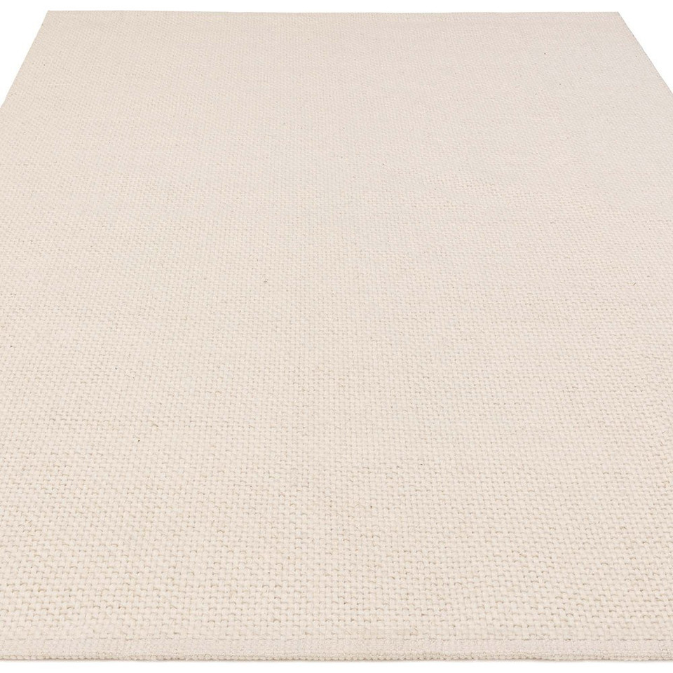 ivory plain flatweave rug portrait angle