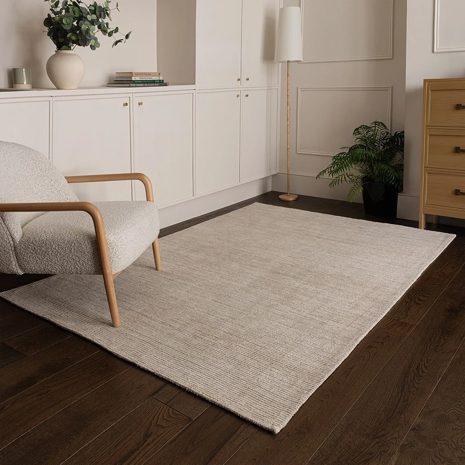 putty plain rug in a living room with matching decor