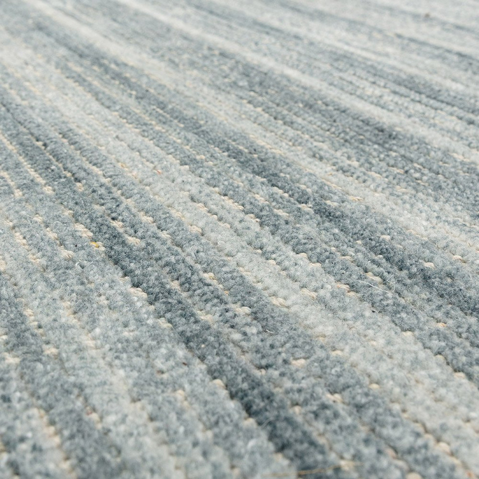 blue plain rug closeup detail