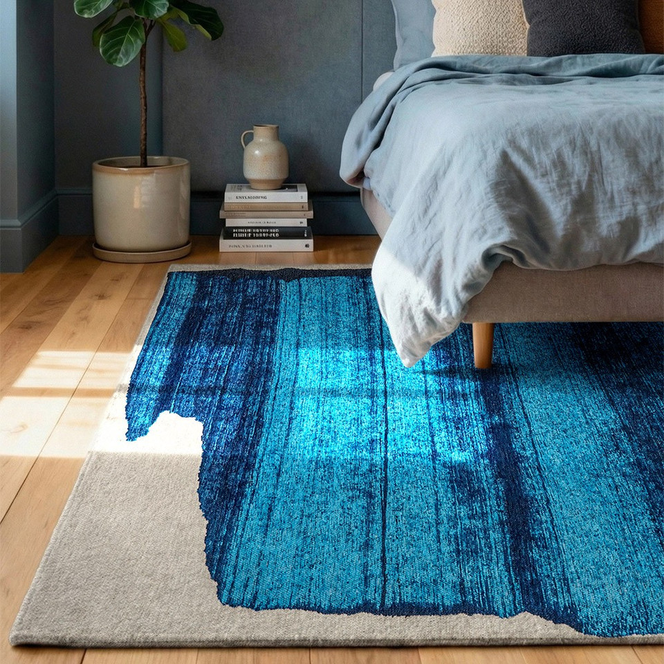 blue abstract eco rug in a bedroom room with matching decor