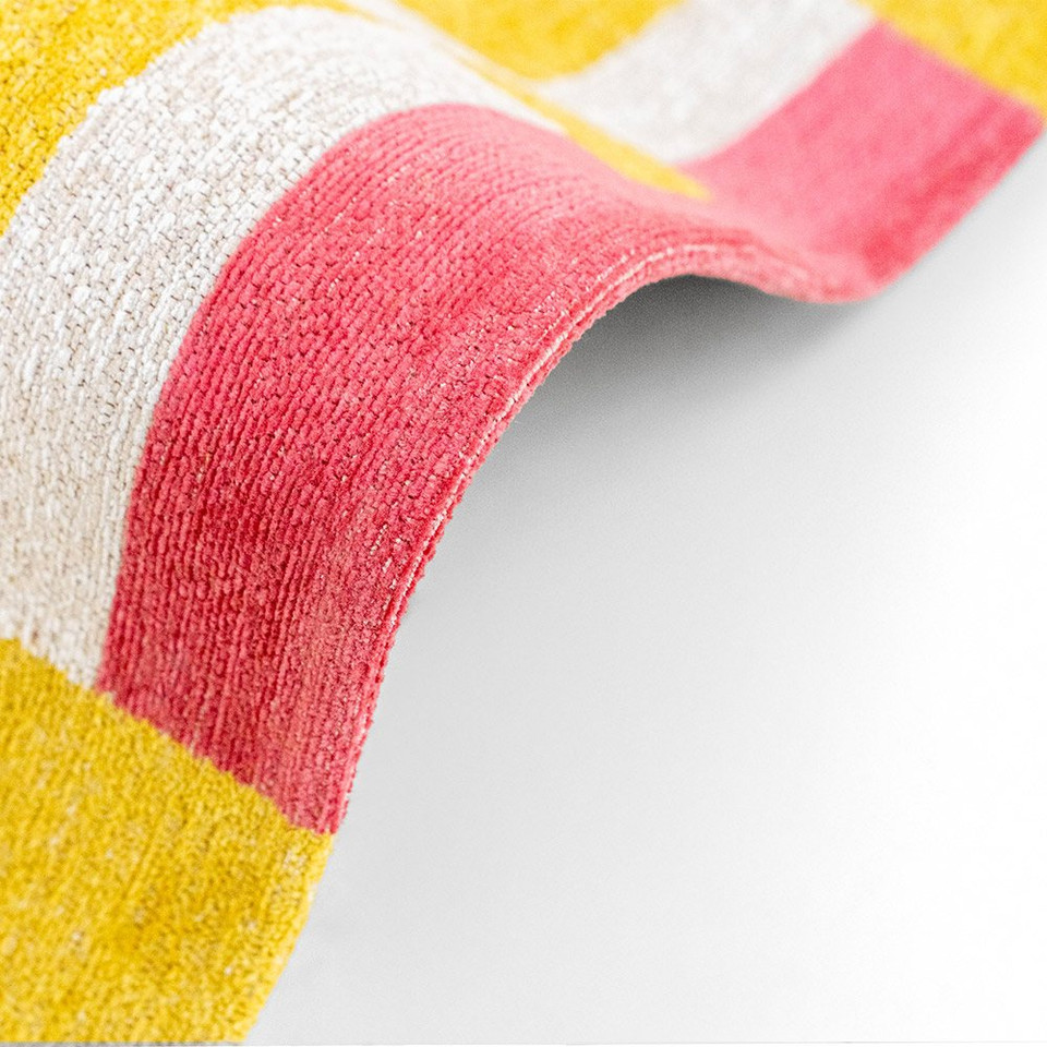 yellow chess eco rug bend on white floor