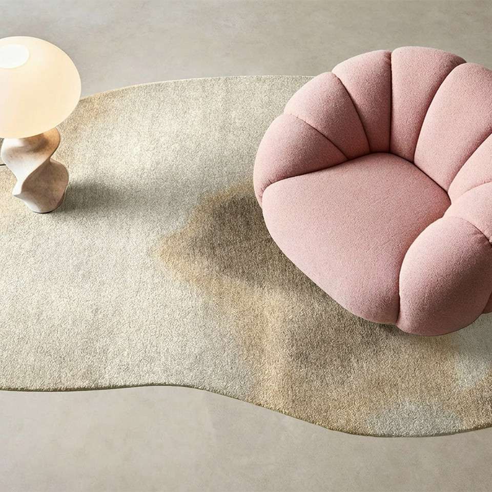 beige peanut shape rug in a living room with matching decor
