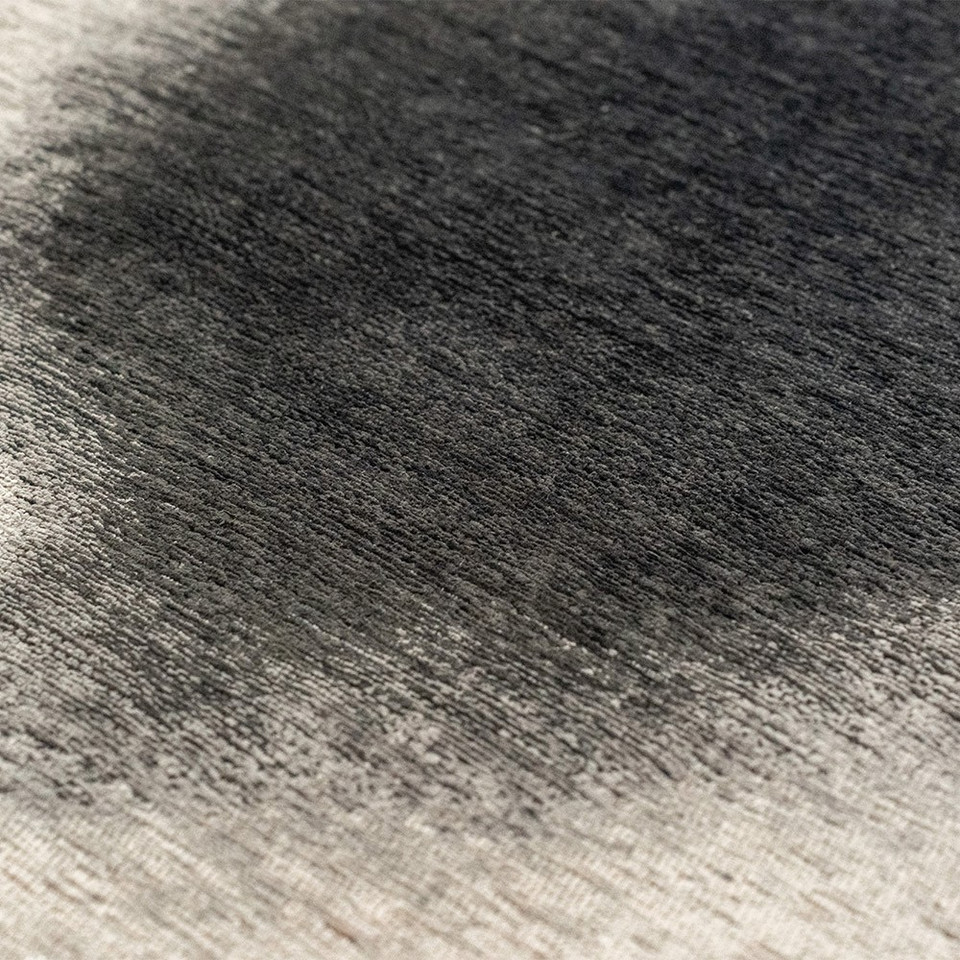 black peanut shape rug closeup detail