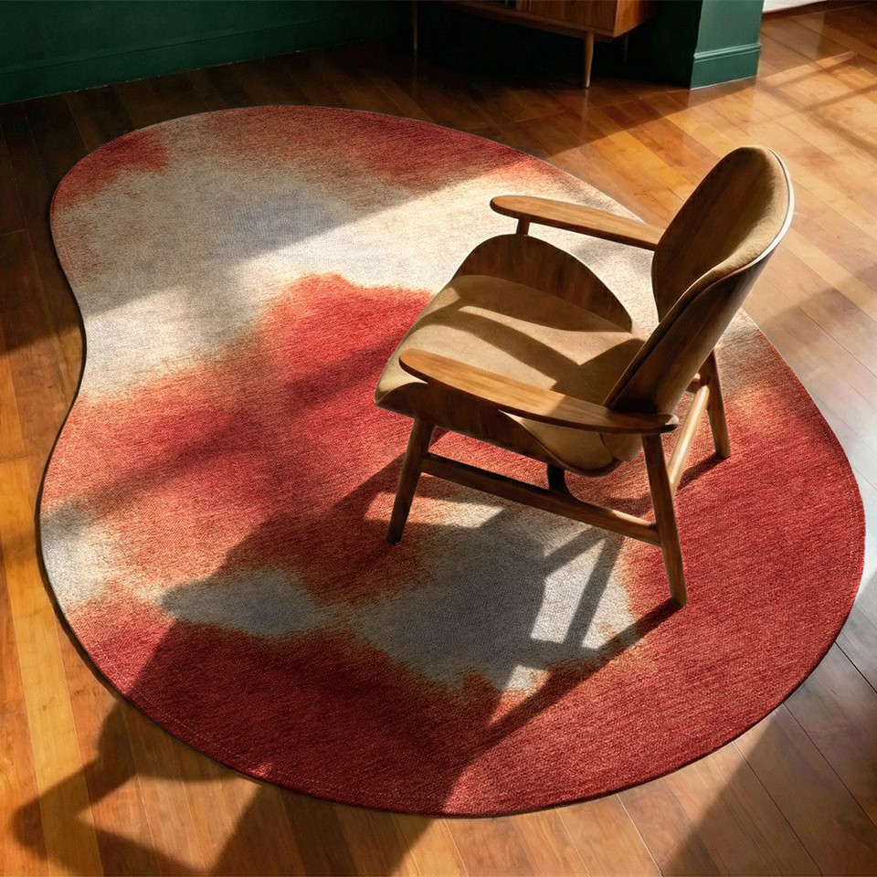 red peanut shape rug in a living room with matching decor
