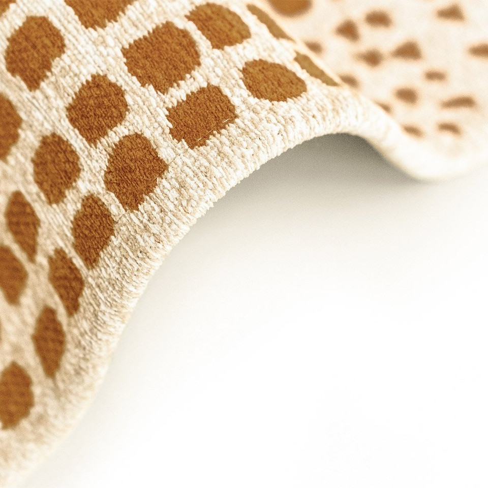 brown abstract eco rug closeup bend on white floor
