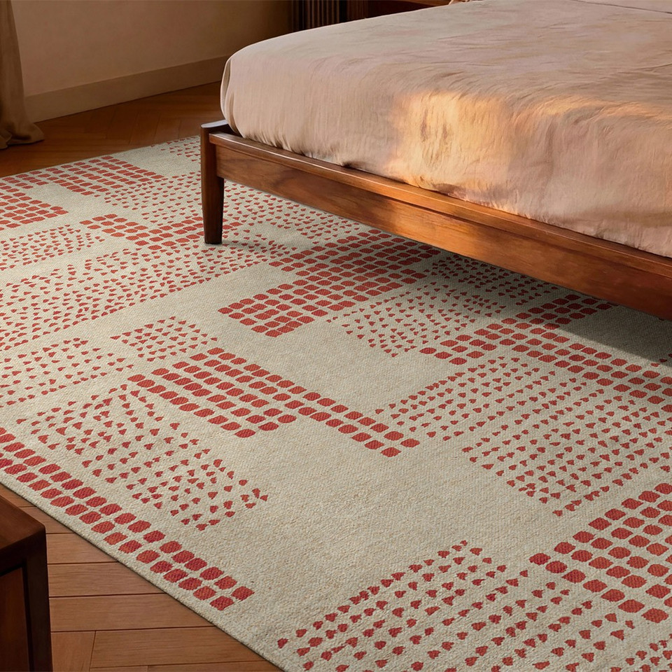 red abstract eco rug in a bedroom room with matching decor