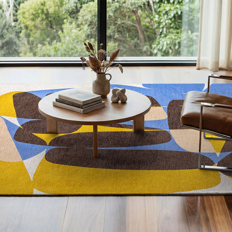 multicolour abstract rug in a bedroom with matching decor