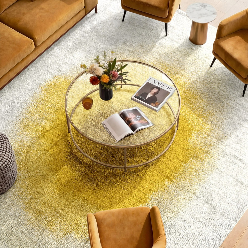 gold abstract rug in a living room with matching decor