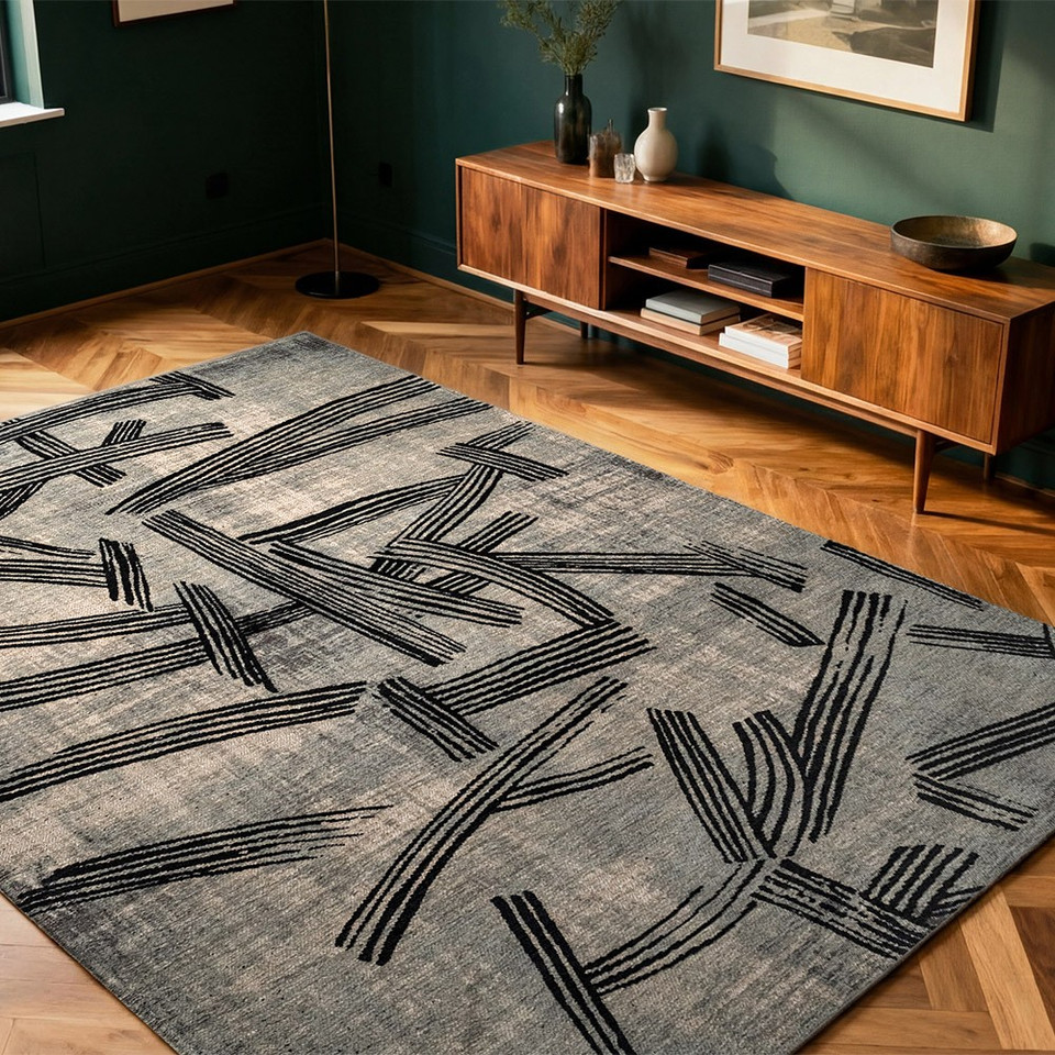 grey abstract rug in a living room with matching decor
