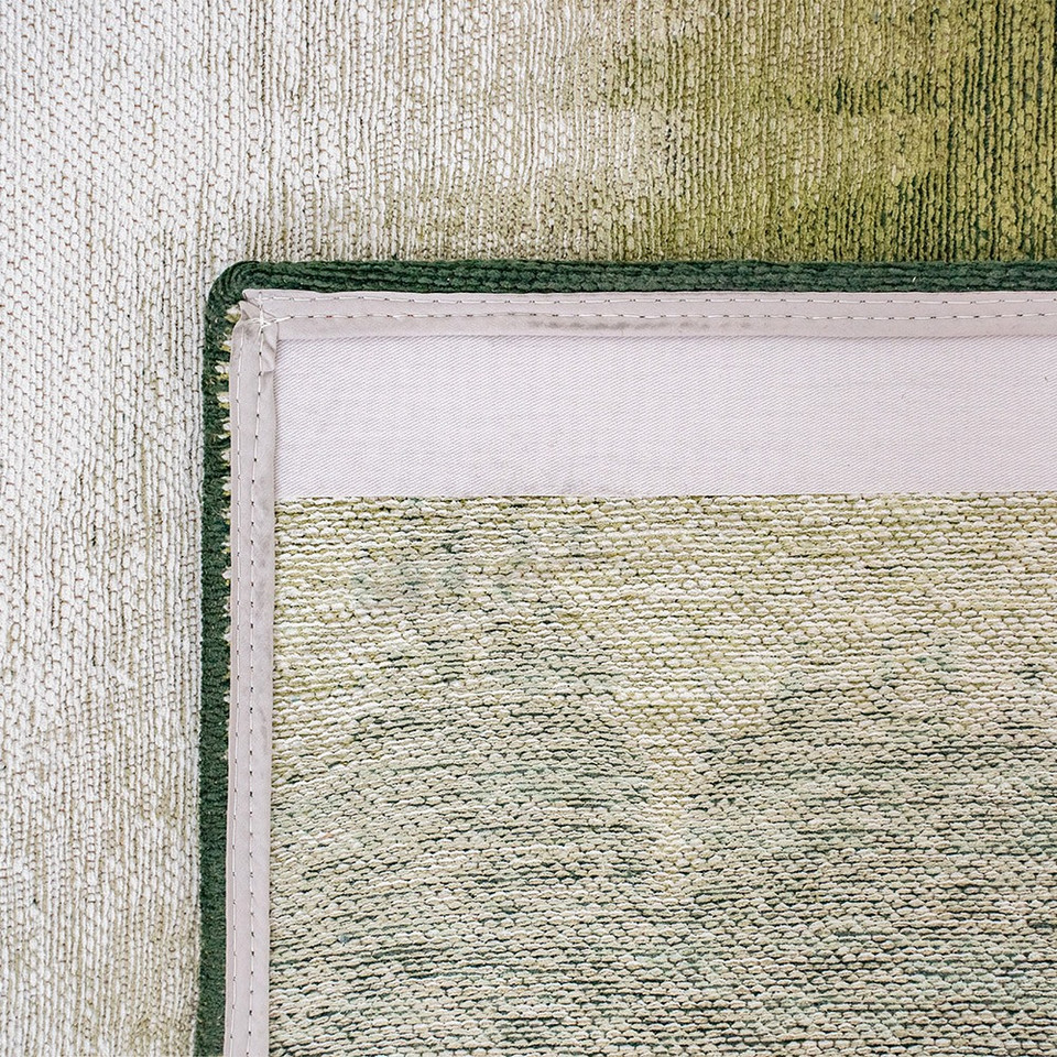 green abstract rug closeup corner fold