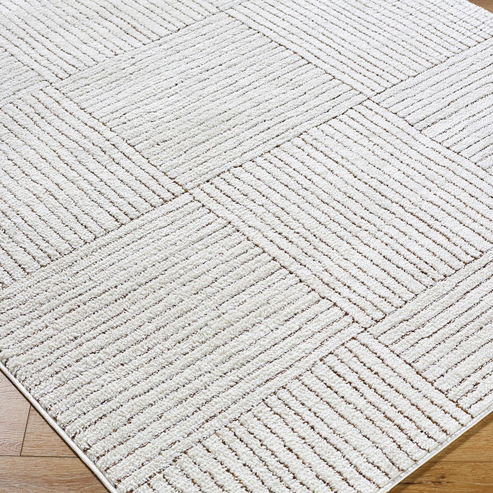 ivory brown scandi rug closeup corner on wood floor
