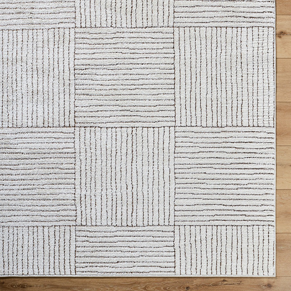 ivory brown scandi rug closeup corner on wood floor