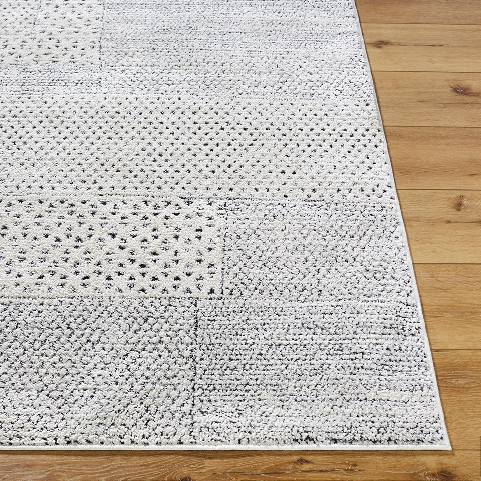ivory scandi rug closeup corner on wood floor