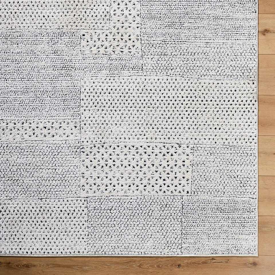 ivory scandi rug closeup corner on wood floor