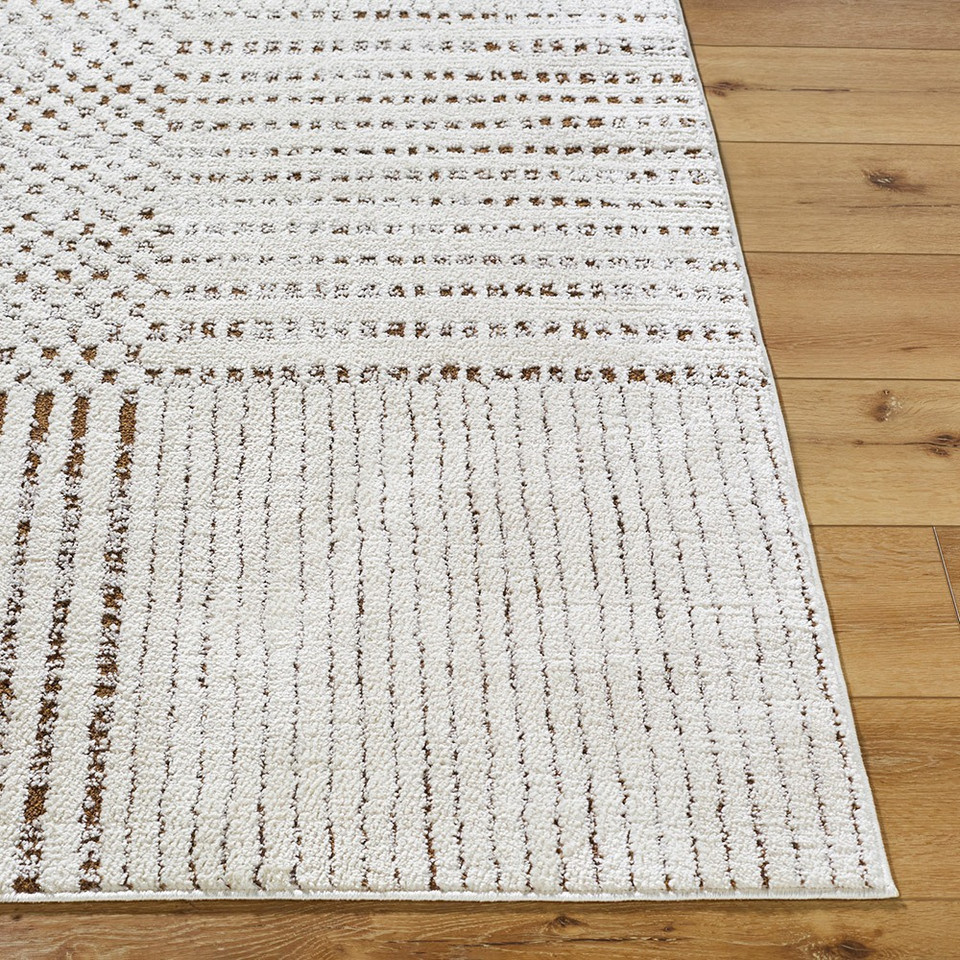 brown ivory scandi rug closeup corner on wood floor