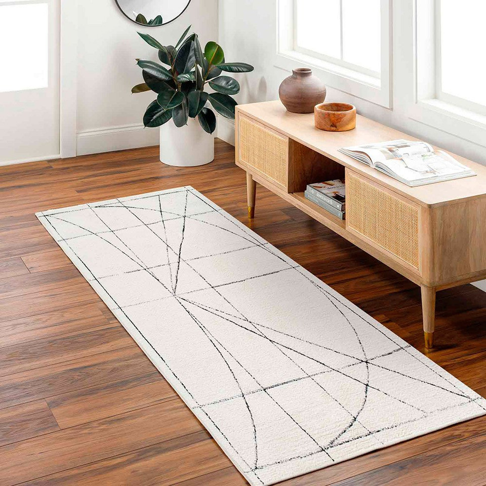 black  ivory scandi rug runner runner in a room with matching decor