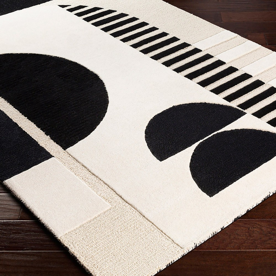 cream geo wool rug in a room with matching decor