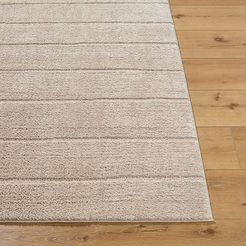 brown scandi rug closeup corner on wood floor