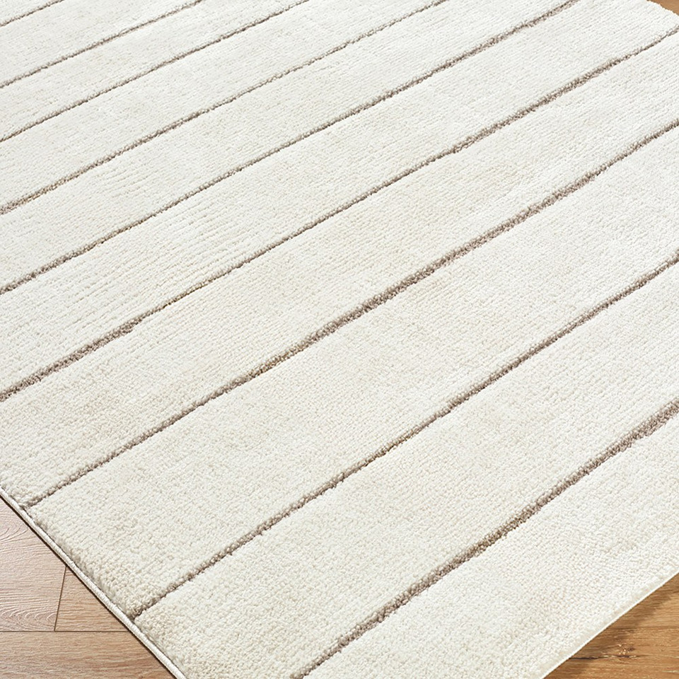 ivory scandi rug closeup corner on wood floor