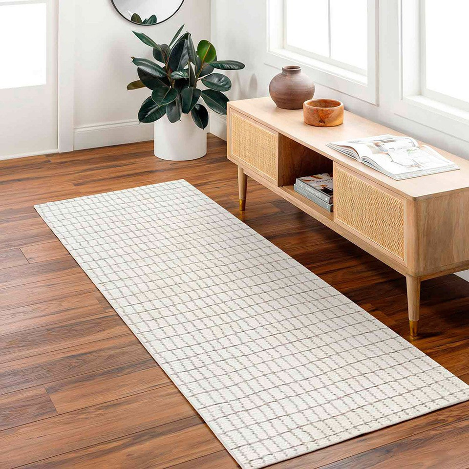 ivory taupe rug in a room with matching decor