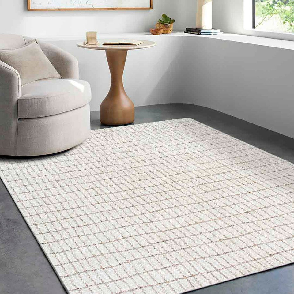 ivory taupe rug in a room with matching decor