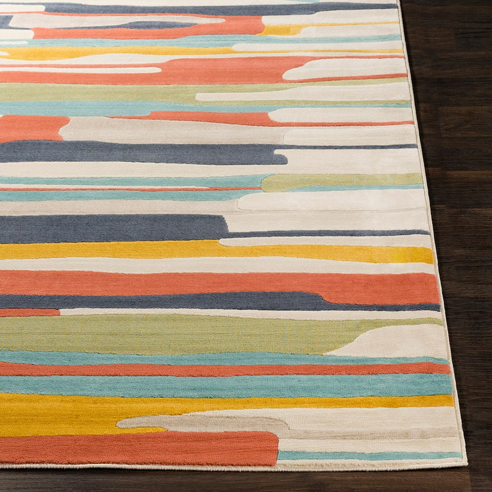 multicolour abstract rug closeup corner on a wood floor