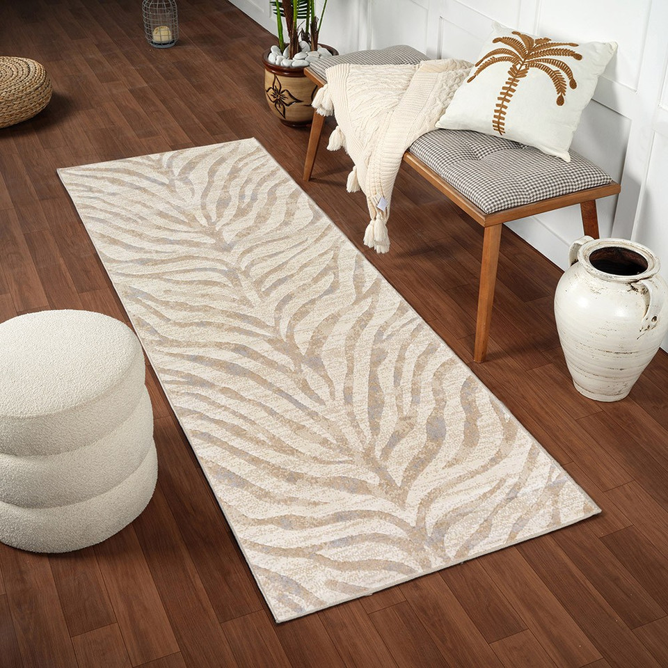 grey zebra pattern rug in a room with matching decor