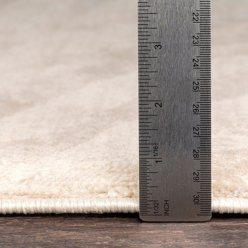 grey zebra pattern rug pile height on wood floor