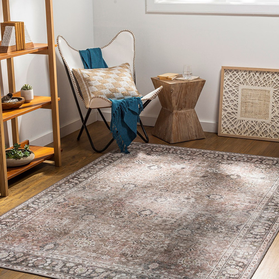 brown traditional rug in a room with matching decor
