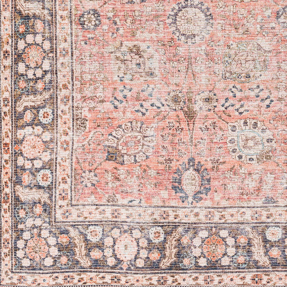 orange traditional rug closeup corner on wood floor