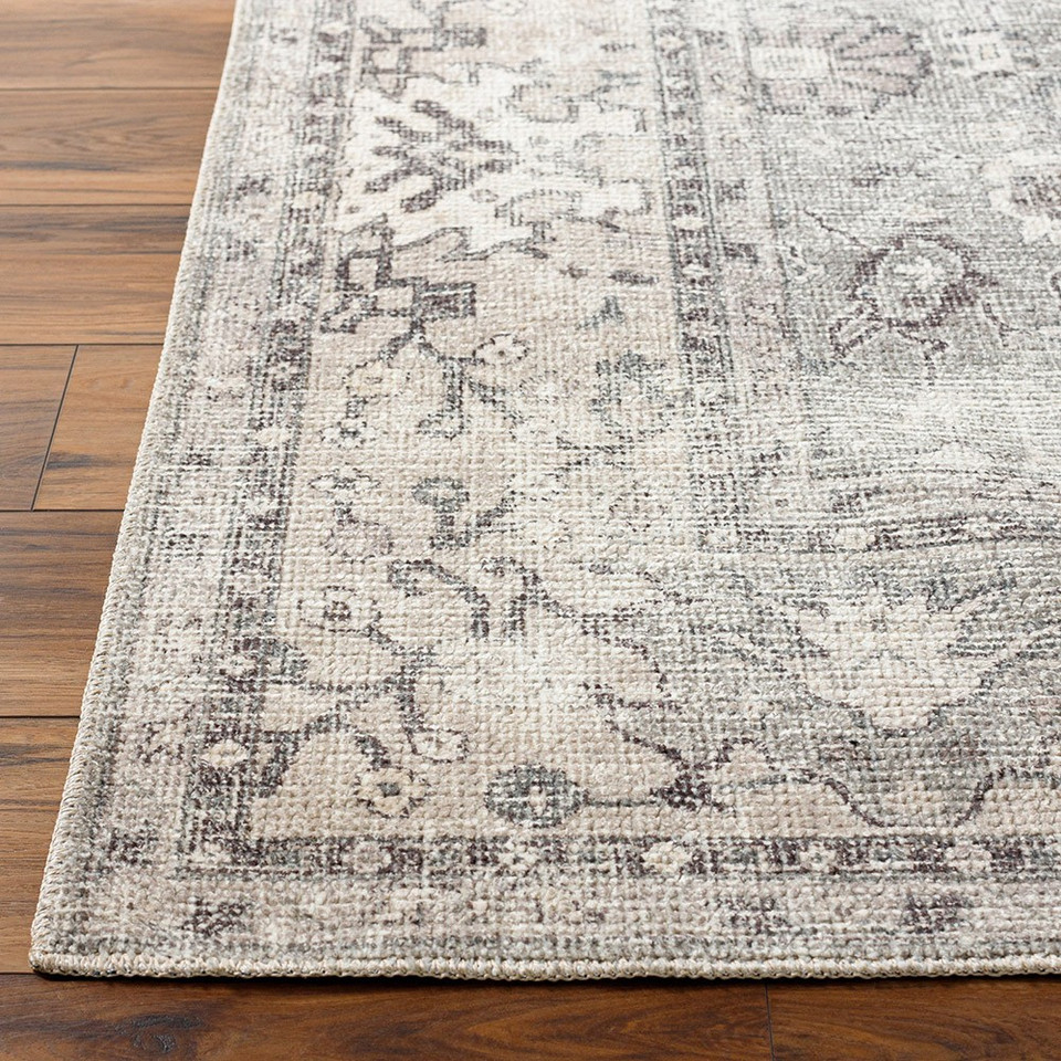 brown traditional rug closeup corner on wood floor