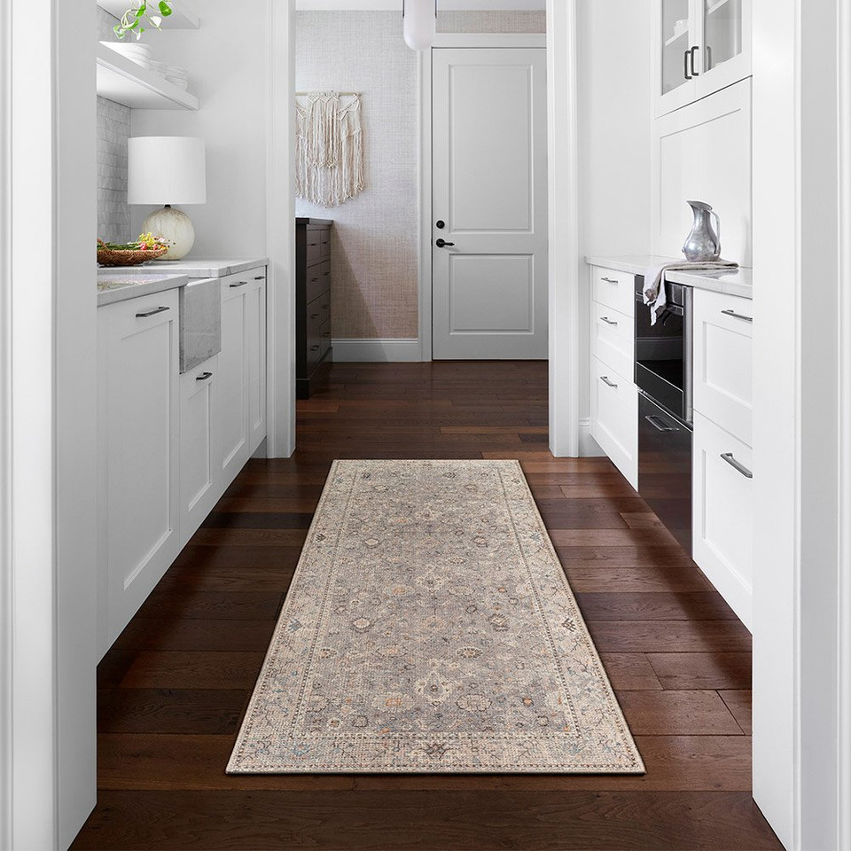 grey traditional rug in a room with matching decor