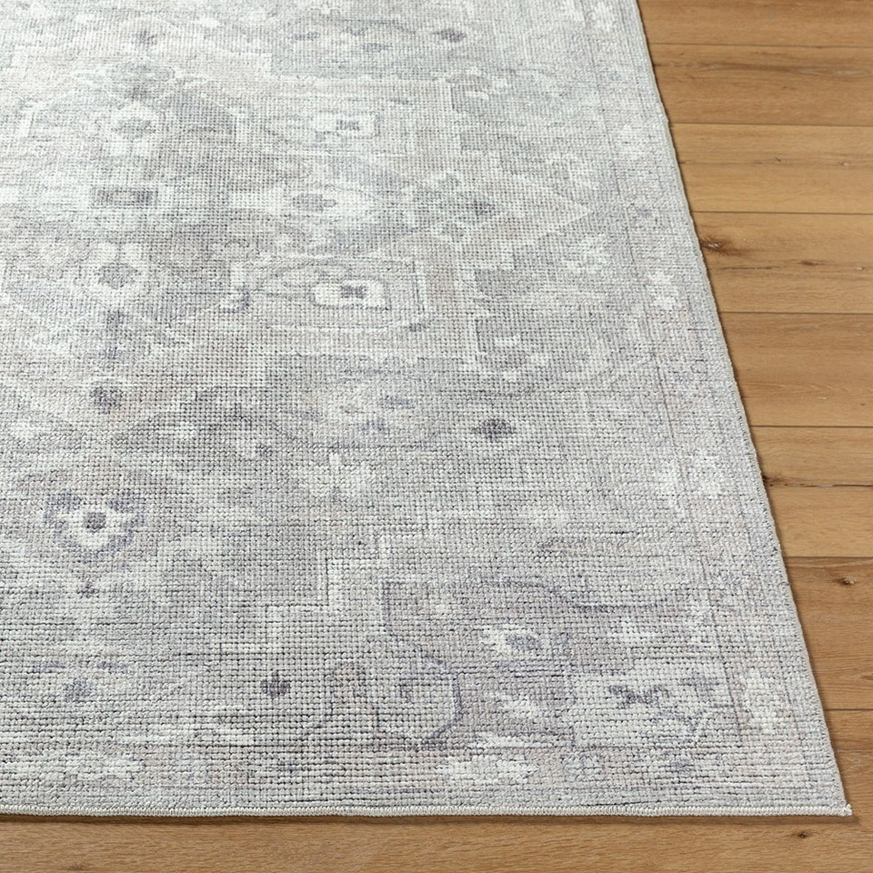 brown traditional rug closeup corner on wood floor
