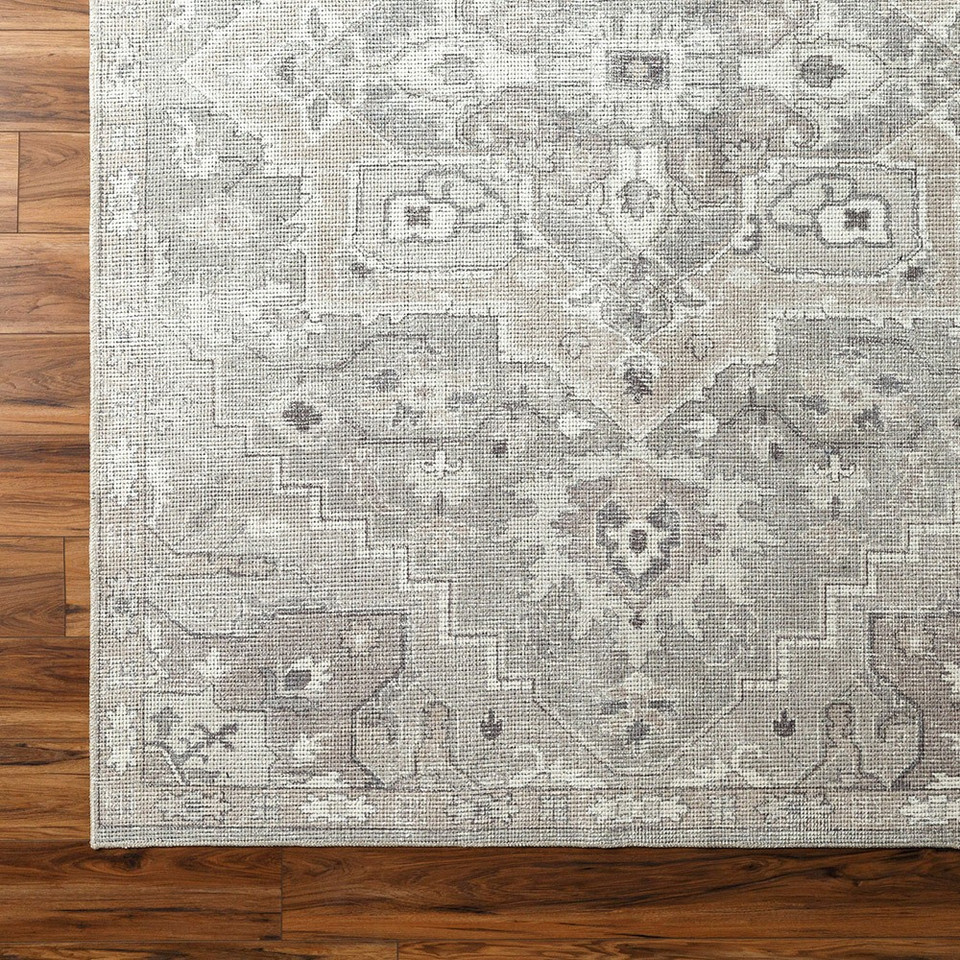 brown traditional rug closeup corner on wood floor