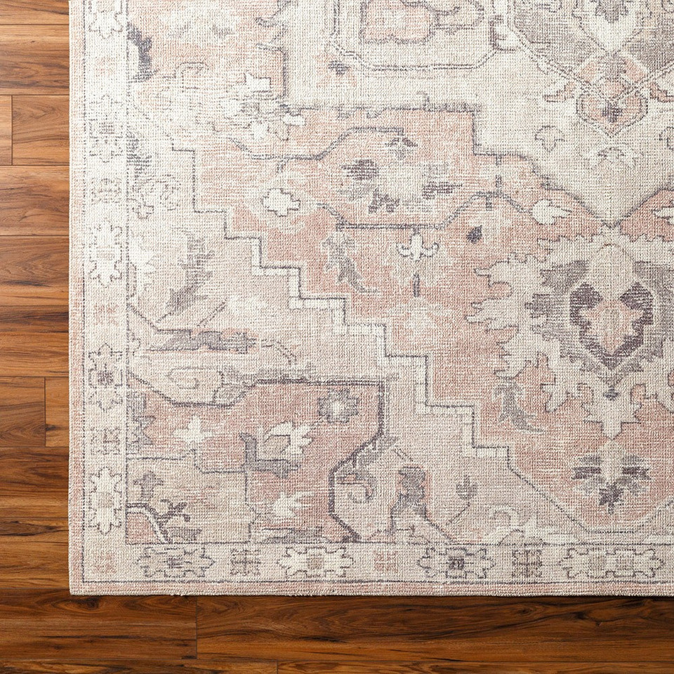 salmon traditional rug closeup corner on wood floor