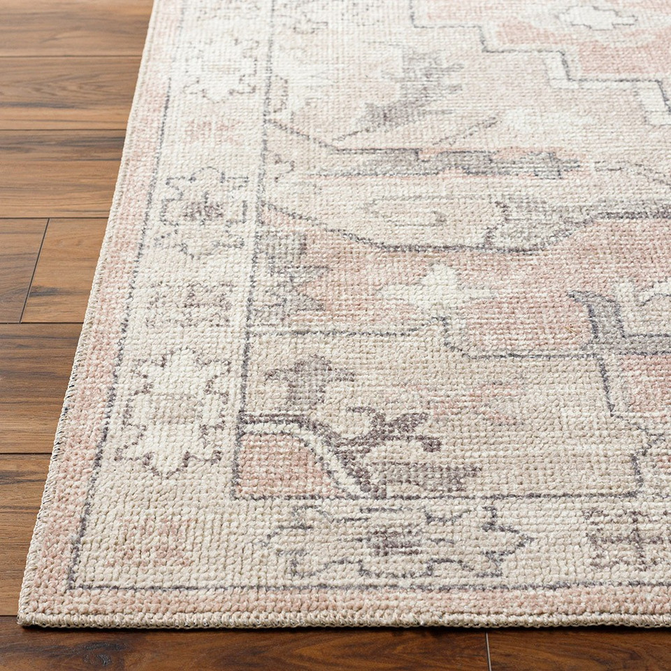 salmon traditional rug closeup corner on wood floor