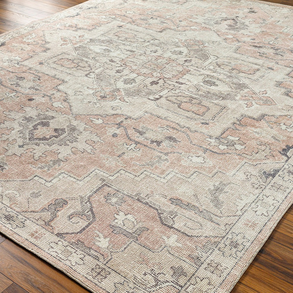salmon traditional rug closeup corner on wood floor