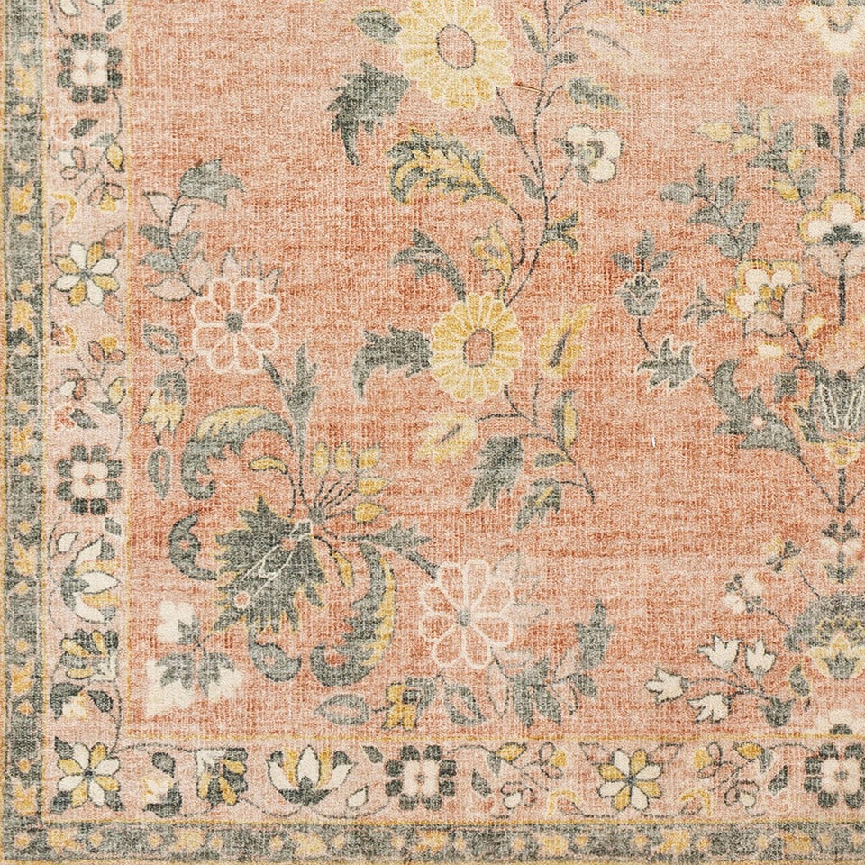 pink  traditional rug closeup corner on wood floor