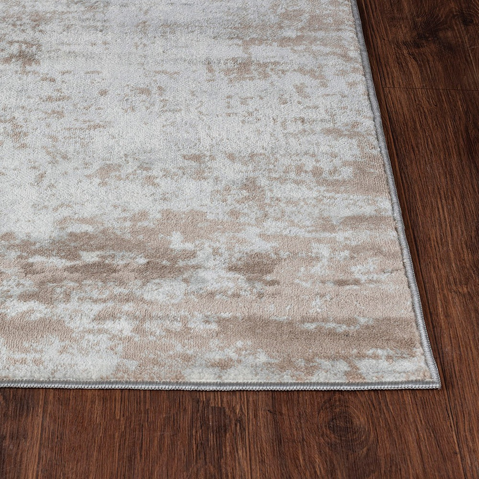 grey abstract rug closeup corner on wood floor