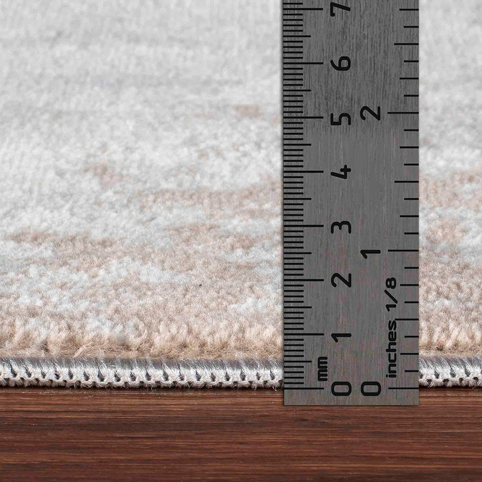 grey abstract rug pile height on wood floor