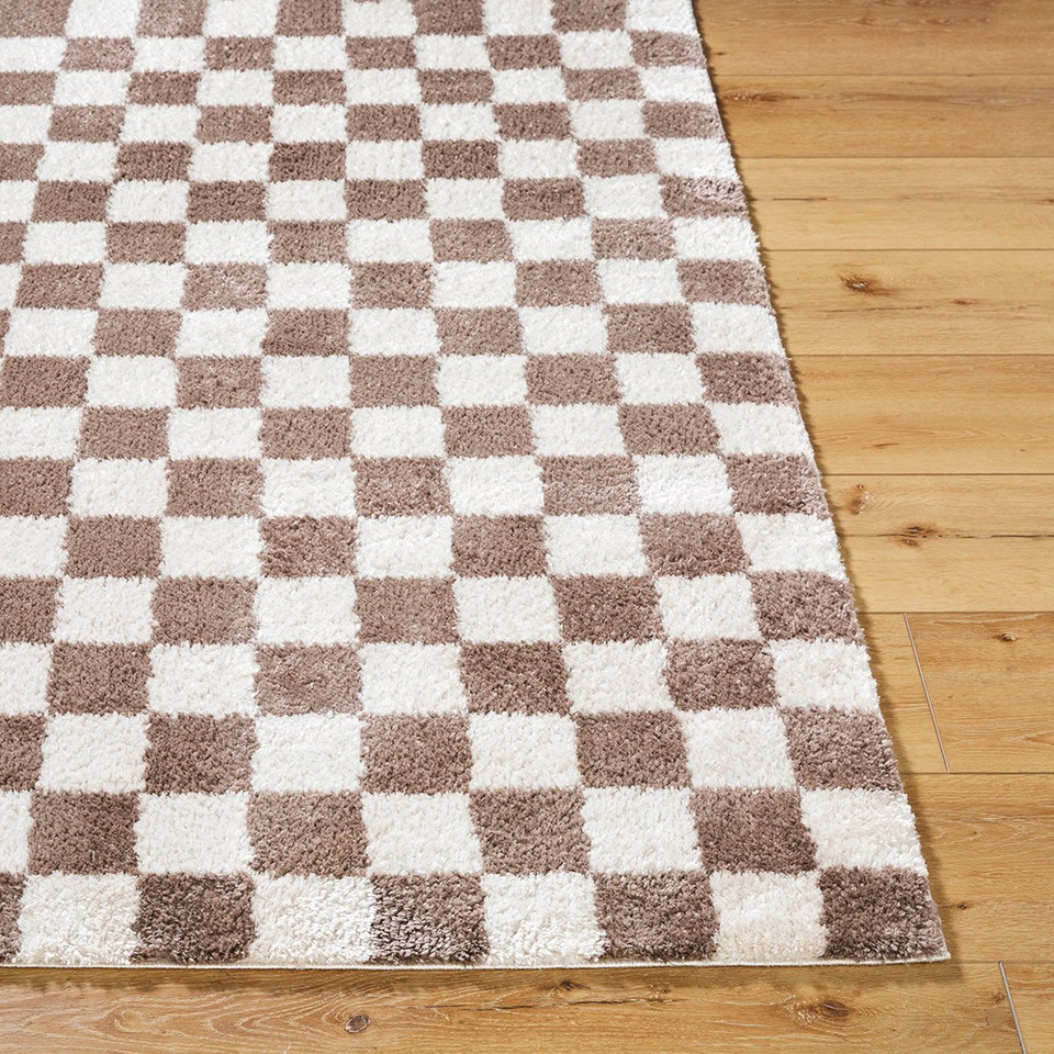 brown checker shaggy rug closeup corner on wood floor