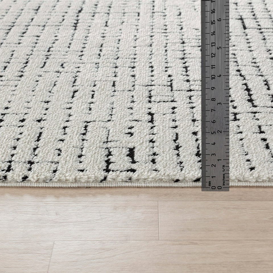 ivory black scandi rug pile height on wood floor