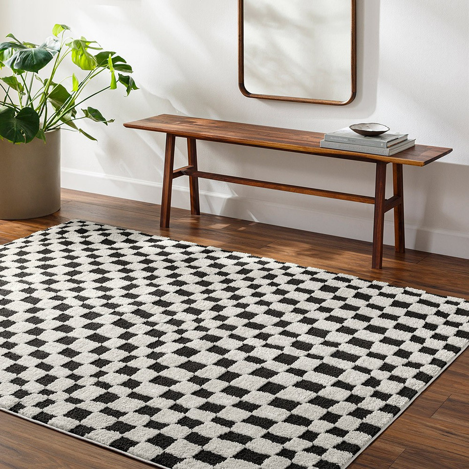 ivory black scandi rug in a room with matching decor