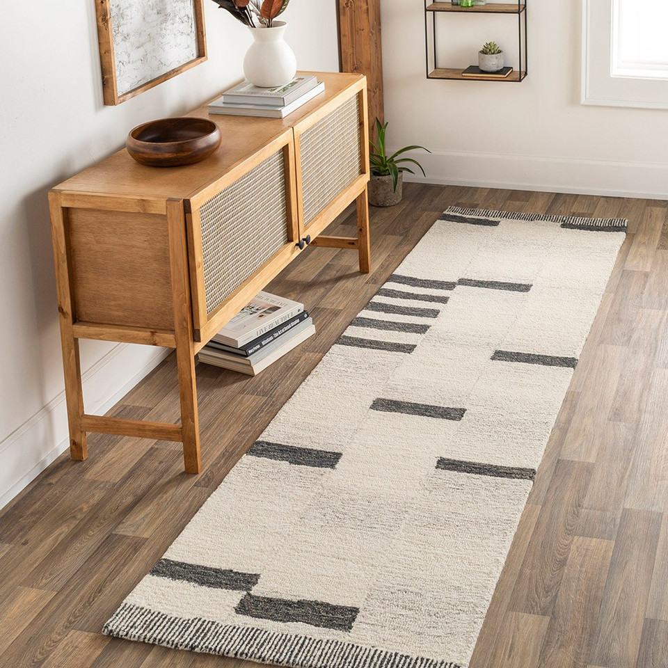 beige striped wool rug in a room with matching decor