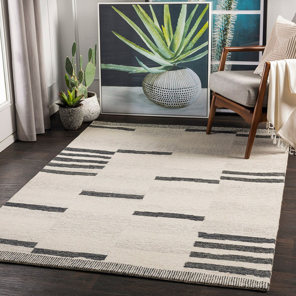 beige striped wool rug in a room with matching decor