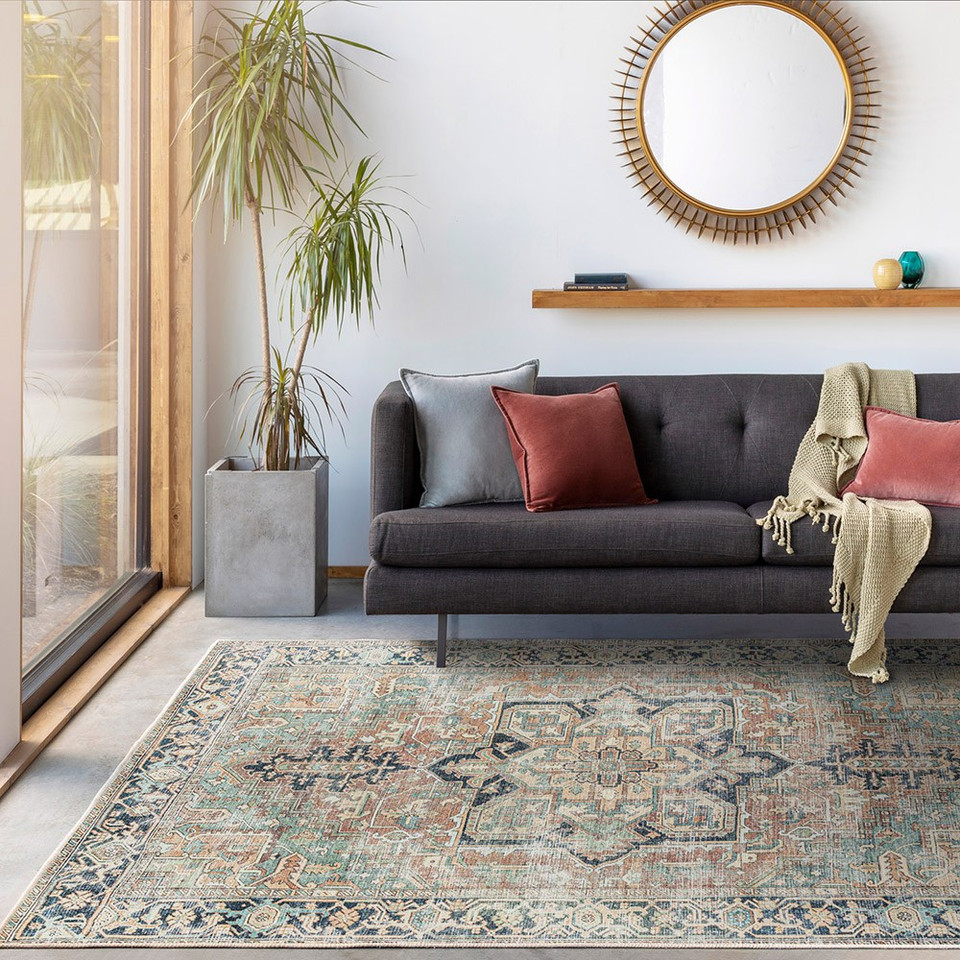 sage traditional rug in a room with matching decor